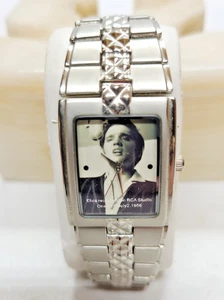 ELVIS PRESLEY WATCH, FACE BLACK & WHITE ELVIS PIC, THE PLASTIC STILL ON BACK OB4 - Picture 1 of 13