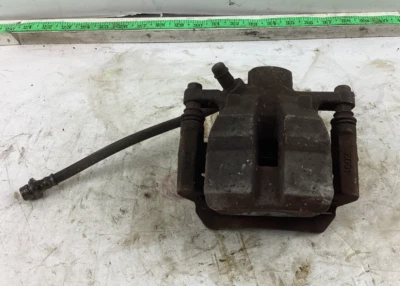 Conjunto de pinza de freno trasera izquierda Toyota Sienna 2011-2018 OEM Foto 1 de 4