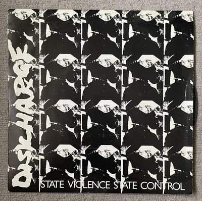 Clay14 A1 AA1 1st Press Discharge State Violence Control 7” Vinyl Record 1982 - Image 1 of 4