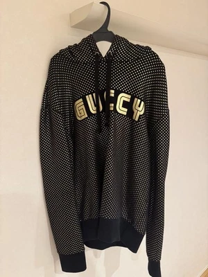 Sudadera con capucha GUCCI patrón de puntos negra dorada Foto 1 de 4