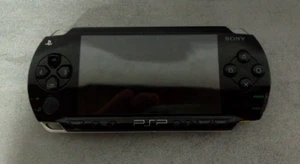 Consola Sony PSP 1003 negra repuestos/reparación defectuosos - Imagen 1 de 3