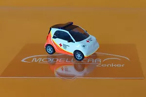 Busch 50726 Smart Fortwo Coupé 2014, DRK Fulda 1:87 NEU Modell - Picture 1 of 2