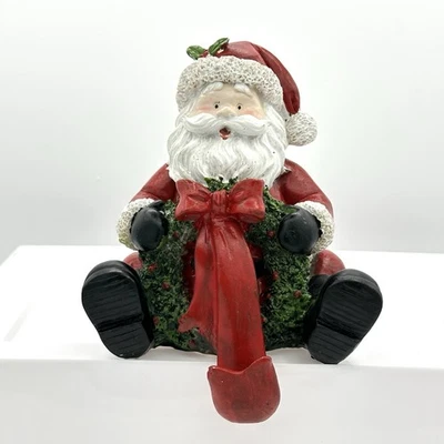 Santa Clause Stocking Hanger Holding Wreath With Bow As Holder Colorful Heavy - Image 1 of 4