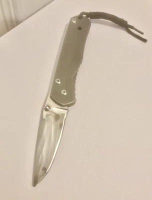 Original Chris Reeve Folding Knife ( 3 7/8” Closed ) Veined Blade - Image 1 of 4