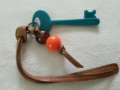 LARGE FOSSIL BAG KEY CHARM BLUE PLASTIC WITH BEADS  - Image 1 of 4