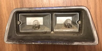 Conjunto de carcasa de luz trasera AMC Gremlin 1970-1976 izquierda Foto 1 de 3