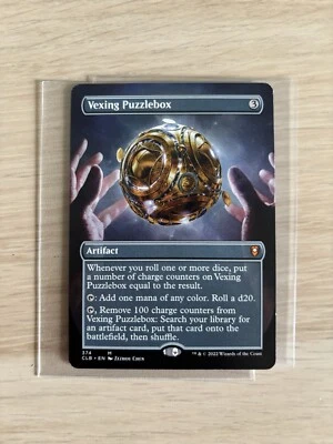 [NM-] Vexing Puzzlebox - Borderless Alternate Art (Showcase) - MTG CLB - Bild 1 von 4