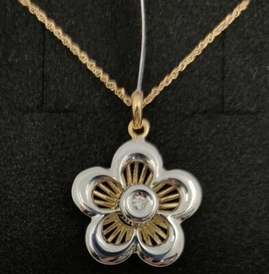 Colgante y cadena oro 18k 750 mls . Flor con oro blanco y díamante 0,042 Q. - Imagen 1 de 4