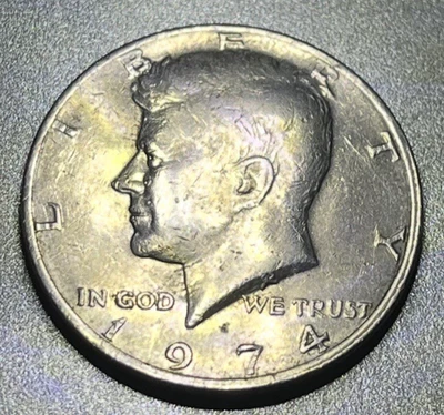 Moneda de 50 centavos Kennedy 1974 - descentrada y doble llanta parcial obv., circ. Foto 1 de 2