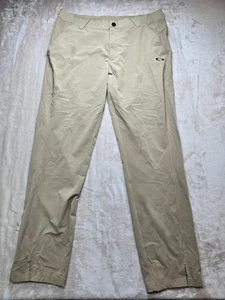 Oakley Pantalone Golf 34x32 Beige Khaki Performance Chino Leggero - Foto 1 di 12