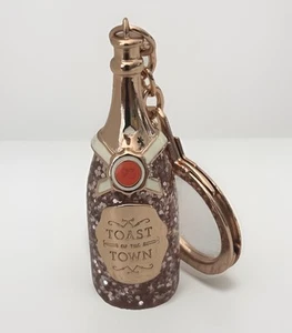 Kate Spade Rose Gold Champagne Toast of the Town Key Fob Keychain Bag Charm EUC! - Picture 1 of 14