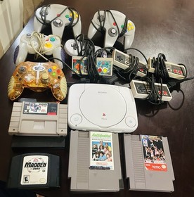 Nintendo controllers and games and more whole lot goes together 