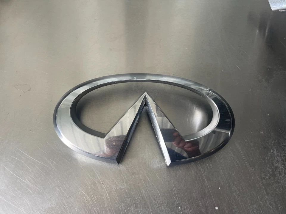 Rejilla OEM 2004-2007 INFINITI QX56 EMBLEMA CROMO Parrilla Logo 62890-7S600 05 06 Foto 1 de 4