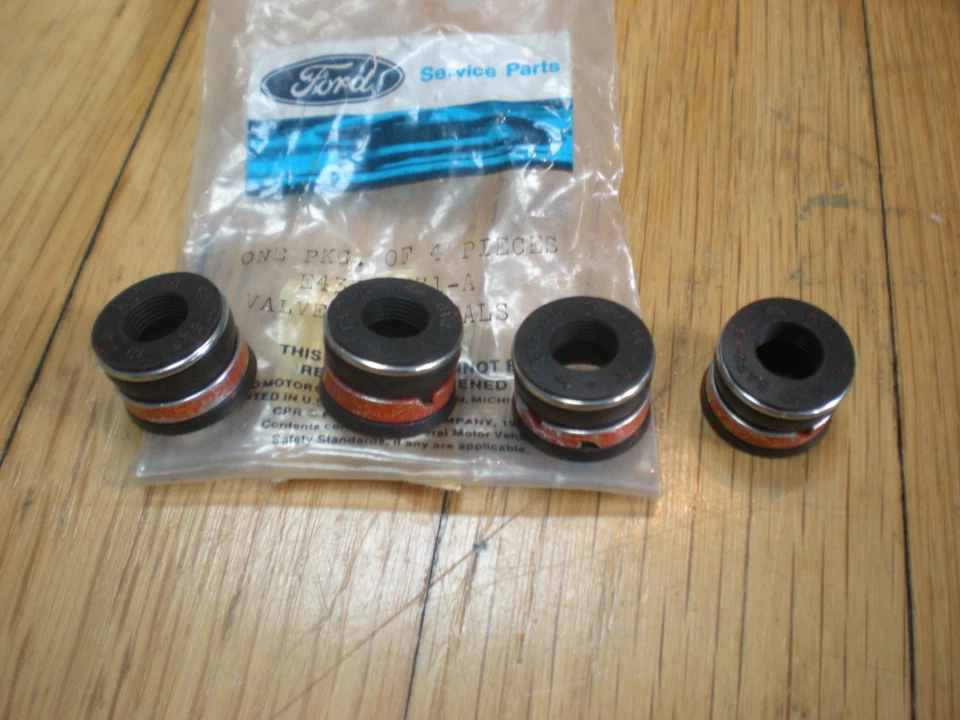 NUEVO DE LOTE 1986 1987 FORD MUSTANG 5,0 L VÁLVULA DE ADMISIÓN SELLOS DE VÁSTAGO E43Z-6571-A Foto 1 de 2