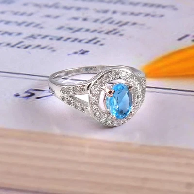 Anillo de plata esterlina con topacio azul | Anillo de compromiso y boda único para mujer” Foto 1 de 4