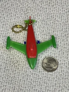 Vintage Toy Rocket or Jet Plane 5 Color Plastic Puzzle Key Chain - Picture 1 of 5