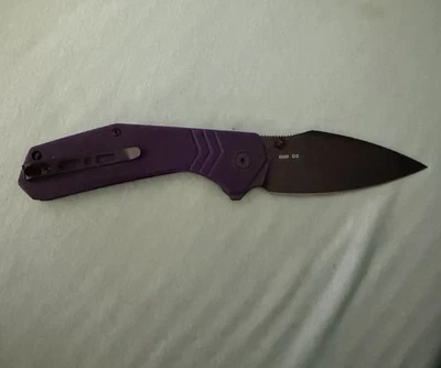 Navaja de Bolsillo Plegable EDC Púrpura Premium - Hoja de Acero D2 con Hoja de Arpón Foto 1 de 2