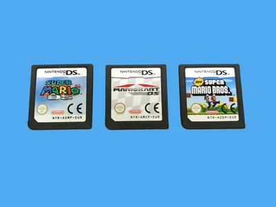 3 Pezzi Giochi Nintendo DS - Super Mario 64, Mario Kart E New Super Mario Bros. - Immagine 1 di 2