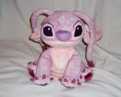 Peluche Angel DISNEYLAND PARIS Lilo et Stitch assise mauve Disney (28 cm) - Photo 1/3