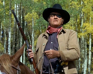 John Wayne Rooster Cogburn The Grit Riding Horse 8x10 Picture Celebrity Print - Picture 1 of 1