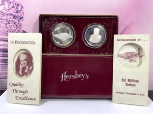 Juego de 2 medallones de plata Hershey .999 1986 en reconocimiento-1989 logro de - Imagen 1 de 3
