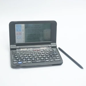 Sharp Wizard OZ-9520 noir portable 512 Ko organisateur de données numérique PDA - LIVRAISON RAPIDE - Photo 1 sur 7