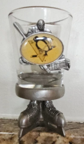 Pittsburgh Penguins NHL Shot Glass On Metal Ice Skates Cover