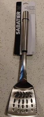 Espátula giratoria de barbacoa de acero inoxidable ranurada Sabatier para barbacoa Foto 1 de 4