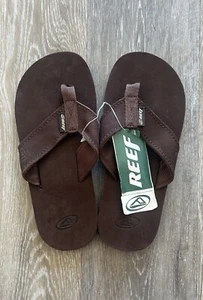 NEU REEF SURF SNOW MX GOLF SUP FOIL LONGBOARD LEDER SANDALEN HERREN 6 DAMEN 7 - Bild 1 von 3