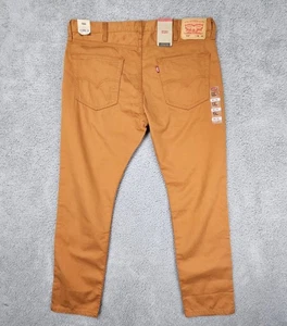Pantalones de mezclilla ajustados Levi’s 512 para hombre 38x30 mezcla de cáñamo coral especiado nuevos con etiquetas naranja quemado - Imagen 1 de 15
