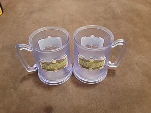 Juego de 2 tazas de plástico Harry Potter Butterbeer mundo mágico recuerdo  - Imagen 1 de 4