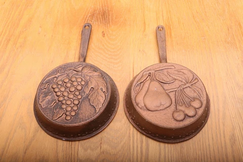 2 Brass Colored Hanging Skillets Fruit Pattern Grape and Pear and Cherry Cover