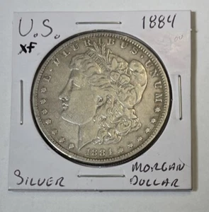1884 $1 Morgan Silver Dollar-EF - Picture 1 of 2