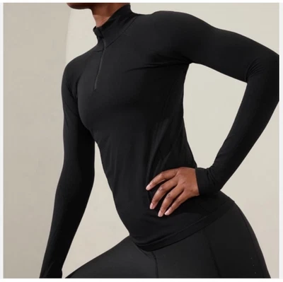Top ATHLETA Momentum Sin Costuras Media Cremallera L | Negro Grande NUEVO $89 Foto 1 de 4