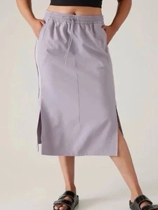 Falda midi Athleta Stride en violeta estrellado minimalista para mujer talla pequeña” - Imagen 1 de 8