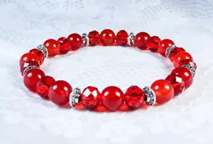 BRACCIALE ELASTICO CYNTHIA LYNN "BAMBINO LUGLIO" ROSSO RUBINO LUGLIO PIETRA NASCITA ARGENTO - Foto 1 di 1