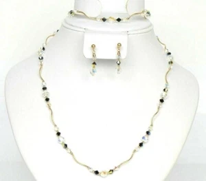 Juego de cuentas de elemento de cristal blanco y negro Swarovski hecho con oro amarillo de 14k - Imagen 1 de 9