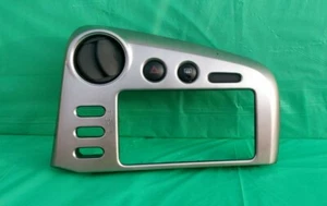 2003-2008 TOYOTA MATRIX / PONTIAC VIBE DASH RADIO BEZEL - GRAY / SILVER TRIM - Picture 1 of 3