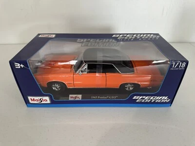 Maisto Edición Especial Escala 1:18 Pontiac GTO Modelo de Coche Diecast 1965 | Naranja Foto 1 de 4