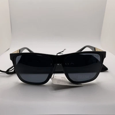 Gafas de sol Prada negras cuadradas doradas templo rojo rayas brazo texturizado Foto 1 de 4