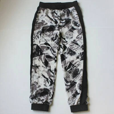 Pantalones Xhilaration Niña Blanco y Negro Floral Rosa Estampado Flores Talla M 7 8 Foto 1 de 3