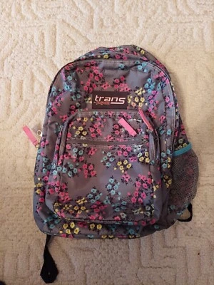 MOCHILA JANSPORT GRIS CON FLORES MULTICOLORES Foto 1 de 4
