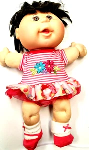 Cabbage Patch Kinder Baby Mädchen Puppe braune Haare braune Augen mit Kleid - Bild 1 von 7