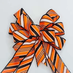 Arco de Halloween a rayas diagonales naranja, negro blanco, tamaño pequeño - Imagen 1 de 2
