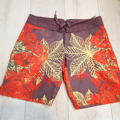 Oakley Brown Tropical Floral Board Shorts Women's sz 6 orange - Image 1 of 4