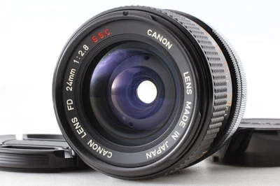 Raro "O" [N COMO NUEVO] Canon FD 24mm f/2.8 S.S.C. Lente MF gran angular... - Imagen 1 de 4