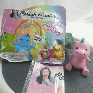 MORIAH ELIZABETH dinosauro rosa sottaceto SERIE 2 COLORI SPRUZZO FIGURA MISTERIOSA NUOVO  - Foto 1 di 15