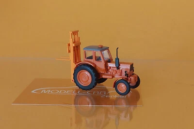 Busch 51353 Belarus MTS-50 mit Hecklift TVE 3200 orangerot 1:87 NEU - Modell - Bild 1 von 2