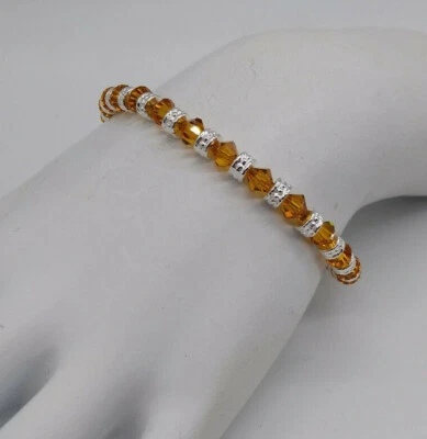 Tobillera o pulsera con cuentas espaciadora bicono y topacio cristal Swarovski m/w Foto 1 de 4