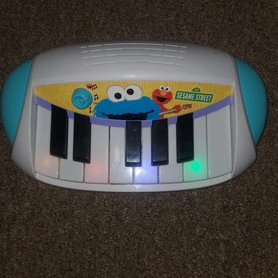 Teclado Hasbro Playskool Sesame Street Cookie Monster ABC Let's Rock 2010 funciona Foto 1 de 4